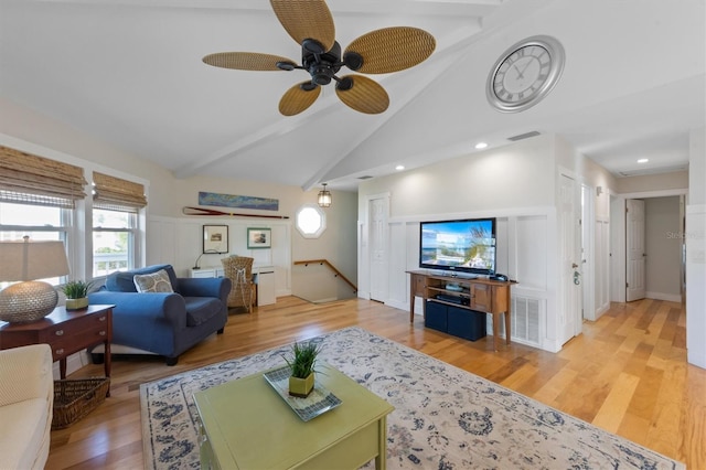 221 85th St, Holmes Beach, FL 34217 - living room with beamed ceiling, a ceiling fan, light wood-style floors, high vaulted ceiling, and recessed lighting