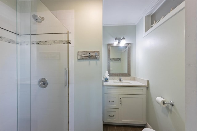 221 85th St, Holmes Beach, FL 34217 - bathroom with a shower stall, vanity, ornamental molding, and toilet