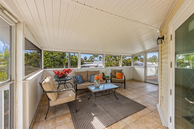 221 85th St, Holmes Beach, FL 34217 - sunroom / solarium with vaulted ceiling and outdoor lounge area