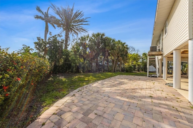 221 85th St, Holmes Beach, FL 34217 - view of patio / terrace featuring stairs