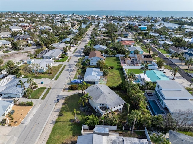 221 85th St, Holmes Beach, FL 34217 - aerial perspective of suburban area featuring a nearby body of water