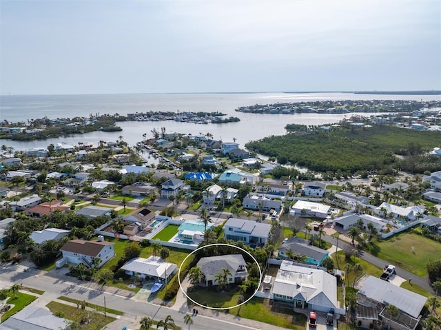 221 85th St, Holmes Beach, FL 34217 - aerial view of residential area with a nearby body of water