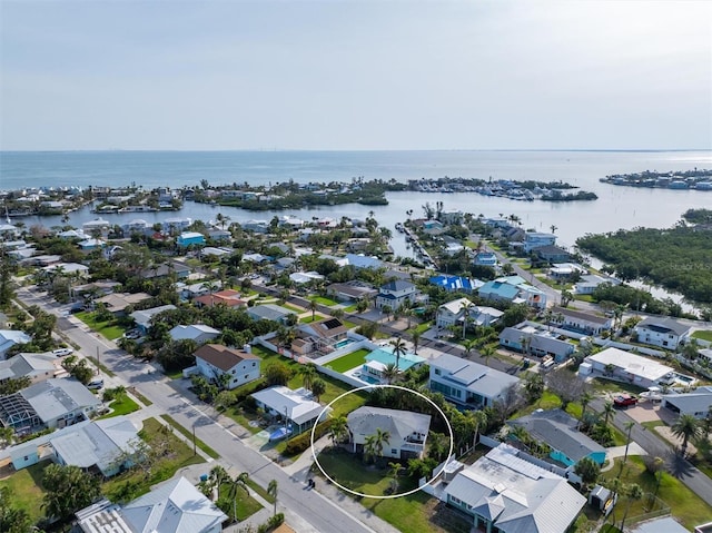 221 85th St, Holmes Beach, FL 34217 - aerial view of residential area with a large body of water