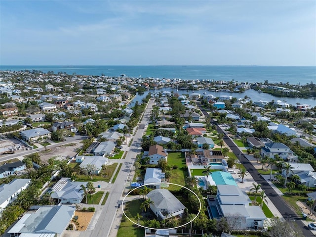 221 85th St, Holmes Beach, FL 34217 - aerial view of residential area with a nearby body of water