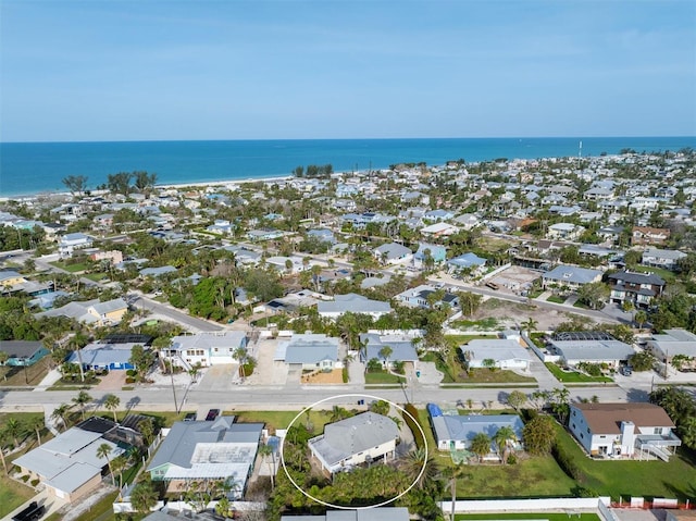 221 85th St, Holmes Beach, FL 34217 - aerial overview of property's location with a nearby body of water and nearby suburban area