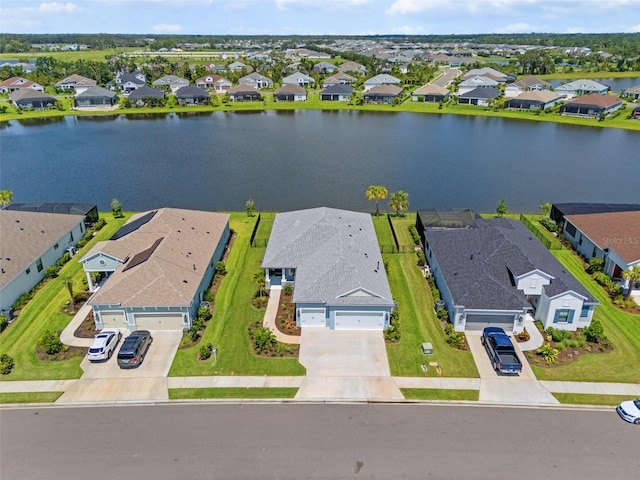 4407 Big Woods Way, Parrish, FL 34219 - aerial view of residential area with a nearby body of water