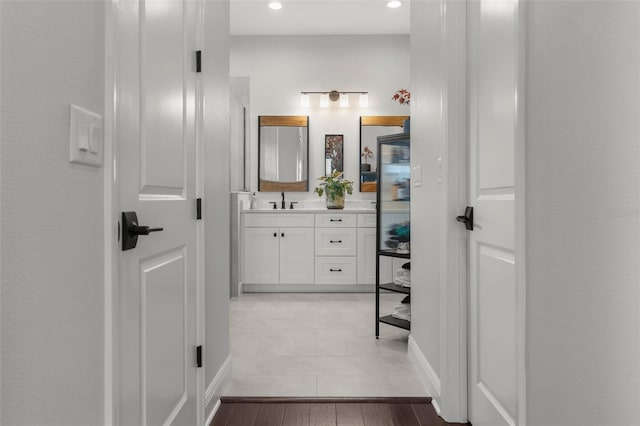 4407 Big Woods Way, Parrish, FL 34219 - bathroom featuring vanity, recessed lighting, and baseboards