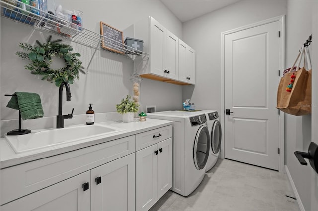 4407 Big Woods Way, Parrish, FL 34219 - washroom featuring cabinet space, washing machine and clothes dryer, and baseboards