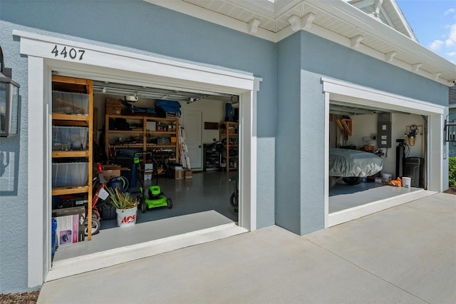 4407 Big Woods Way, Parrish, FL 34219 - garage featuring driveway