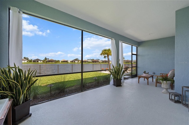 4407 Big Woods Way, Parrish, FL 34219 - unfurnished sunroom featuring a residential view, concrete floors, and a textured wall
