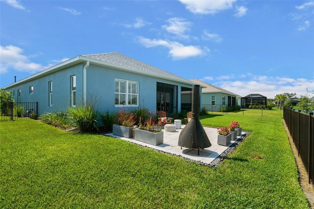 4407 Big Woods Way, Parrish, FL 34219 - back of house featuring stucco siding and a patio