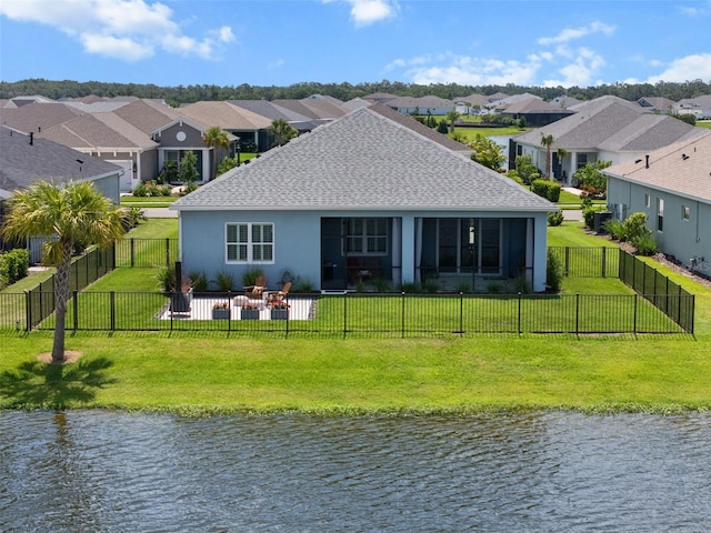 4407 Big Woods Way, Parrish, FL 34219 - back of house with a residential view, a water view, a shingled roof, and stucco siding