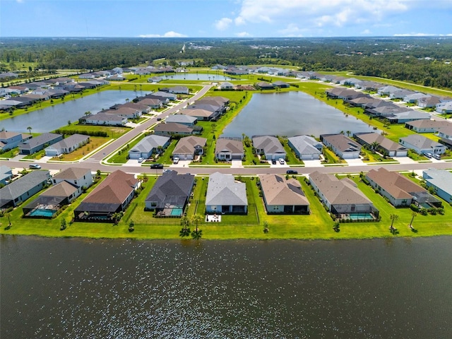4407 Big Woods Way, Parrish, FL 34219 - aerial view of residential area featuring a large body of water