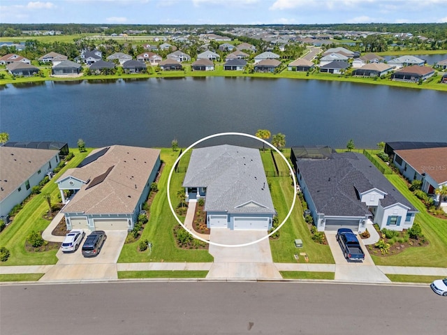 4407 Big Woods Way, Parrish, FL 34219 - aerial view of residential area featuring a nearby body of water
