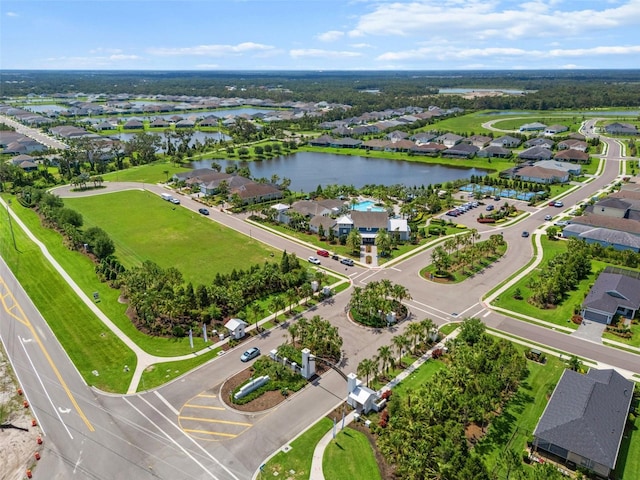4407 Big Woods Way, Parrish, FL 34219 - aerial view of residential area featuring a large body of water