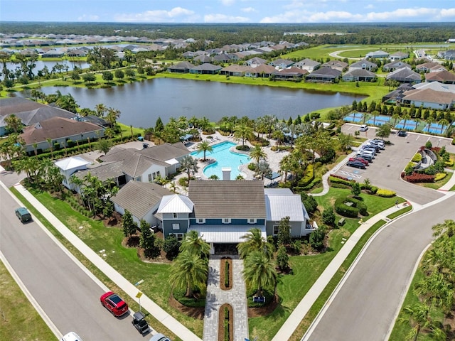 4407 Big Woods Way, Parrish, FL 34219 - aerial perspective of suburban area with a nearby body of water and a pool area