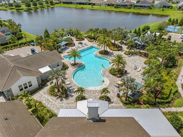 4407 Big Woods Way, Parrish, FL 34219 - aerial view of residential area with a pool and a large body of water