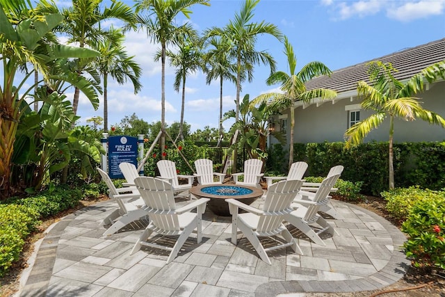 4407 Big Woods Way, Parrish, FL 34219 - view of patio / terrace with a fire pit