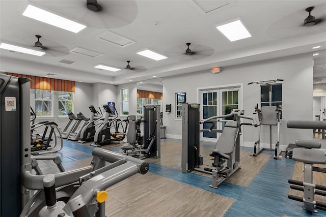 4407 Big Woods Way, Parrish, FL 34219 - workout area featuring baseboards, ceiling fan, and wood finished floors