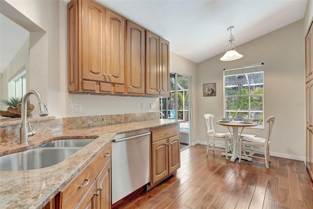 4322 Concert St, Port Charlotte, FL 33948 - kitchen with a sink, dishwasher, light stone countertops, lofted ceiling, and wood finished floors