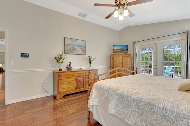 4322 Concert St, Port Charlotte, FL 33948 - bedroom with access to outside, lofted ceiling, french doors, wood finished floors, and baseboards
