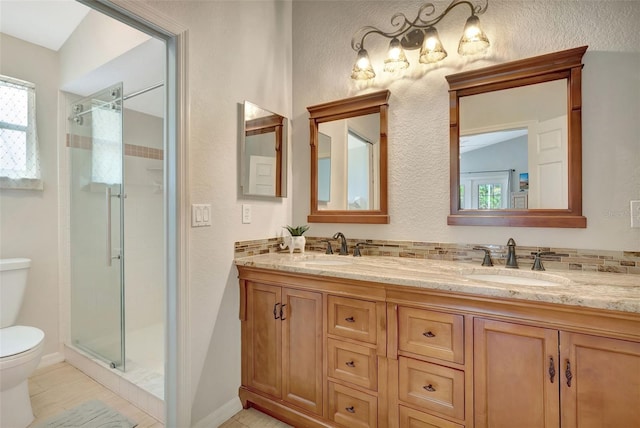 4322 Concert St, Port Charlotte, FL 33948 - bathroom with toilet, a shower stall, and double vanity
