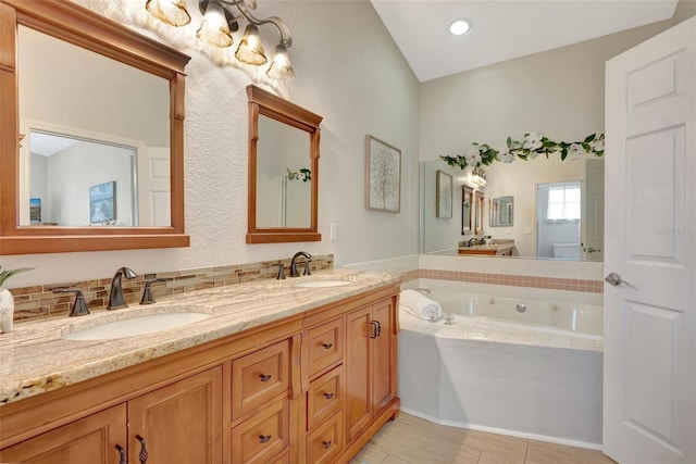 4322 Concert St, Port Charlotte, FL 33948 - bathroom featuring double vanity and a whirlpool tub