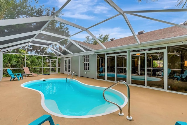 4322 Concert St, Port Charlotte, FL 33948 - outdoor pool with a patio area, a lanai, and french doors