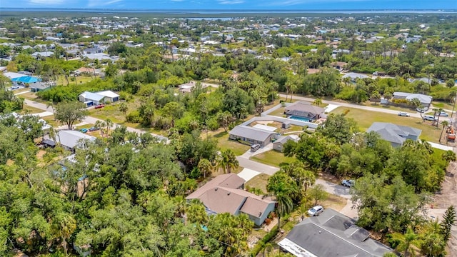 4322 Concert St, Port Charlotte, FL 33948 - aerial view of property and surrounding area with nearby suburban area