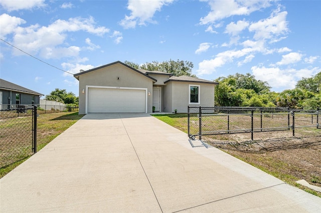 1229 Zinnia Loop, Labelle, FL 33935 - single story home featuring concrete driveway, stucco siding, and a garage