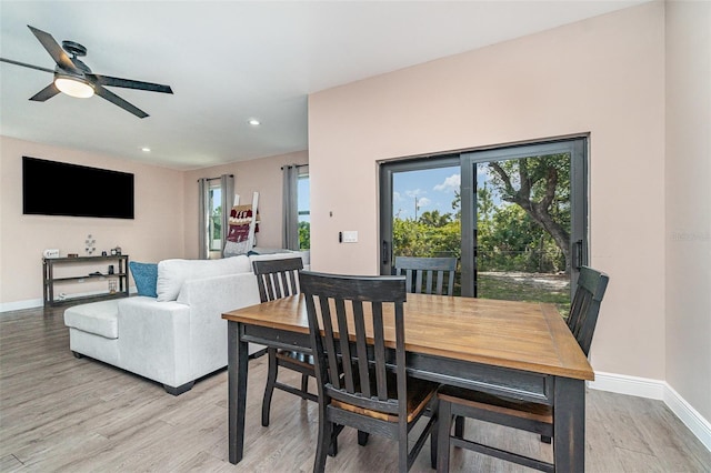 1229 Zinnia Loop, Labelle, FL 33935 - dining area with light wood-style floors, ceiling fan, baseboards, and recessed lighting