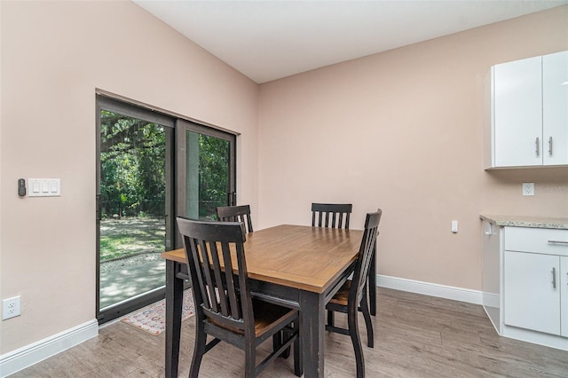 1229 Zinnia Loop, Labelle, FL 33935 - dining room featuring light wood-style floors and baseboards