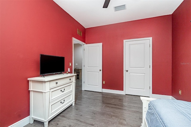 1229 Zinnia Loop, Labelle, FL 33935 - bedroom with wood finished floors, baseboards, and a ceiling fan