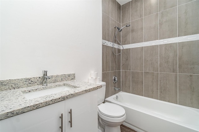 1229 Zinnia Loop, Labelle, FL 33935 - bathroom featuring vanity, toilet, and bathtub / shower combination