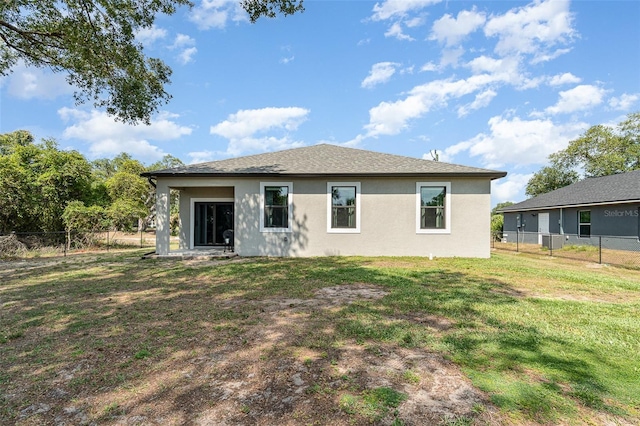 1229 Zinnia Loop, Labelle, FL 33935 - back of house featuring stucco siding