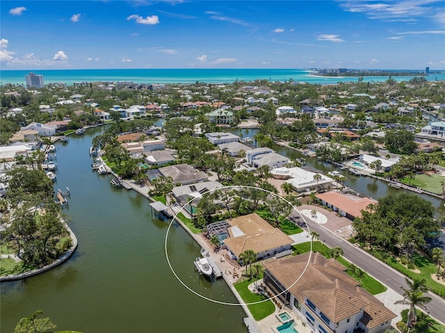 572 Commonwealth Ln, Sarasota, FL 34242 - aerial perspective of suburban area with a nearby body of water