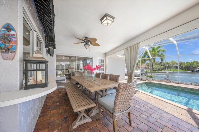 572 Commonwealth Ln, Sarasota, FL 34242 - view of patio / terrace with ceiling fan, glass enclosure, and an outdoor pool