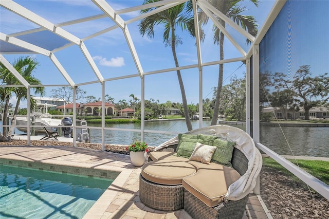 572 Commonwealth Ln, Sarasota, FL 34242 - view of pool with a water view, glass enclosure, a boat dock, and a patio