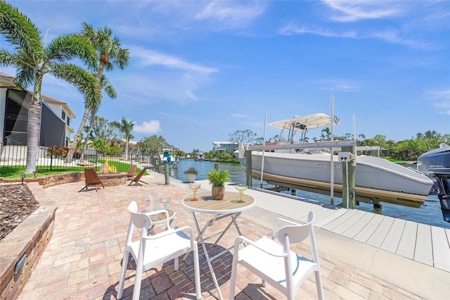 572 Commonwealth Ln, Sarasota, FL 34242 - dock with boat lift and a water view