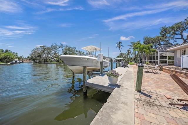 572 Commonwealth Ln, Sarasota, FL 34242 - dock area with boat lift, a water view, and glass enclosure