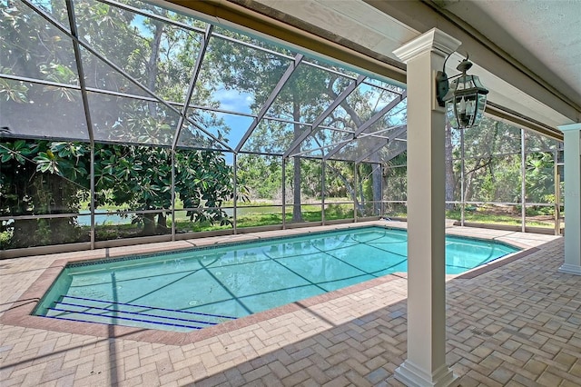 4917 Leatha Ln, Sarasota, FL 34232 - outdoor pool featuring a lanai and a patio area