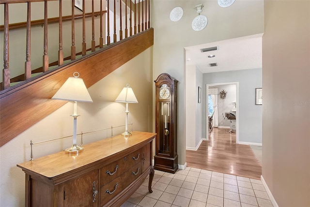 4917 Leatha Ln, Sarasota, FL 34232 - hall with light tile patterned flooring and baseboards