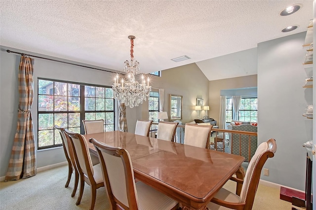 4917 Leatha Ln, Sarasota, FL 34232 - dining space featuring light carpet, baseboards, a chandelier, lofted ceiling, and a textured ceiling