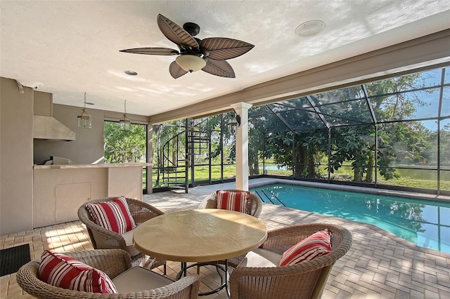 4917 Leatha Ln, Sarasota, FL 34232 - outdoor pool featuring a patio area, glass enclosure, and ceiling fan