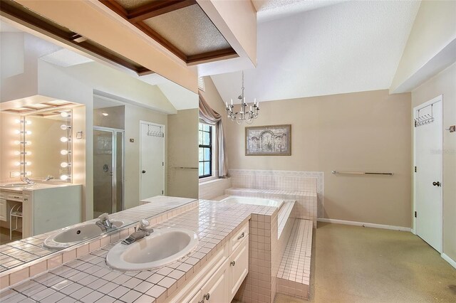 4917 Leatha Ln, Sarasota, FL 34232 - bathroom with lofted ceiling, vanity, a stall shower, a bath, and baseboards