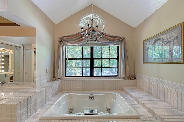 4917 Leatha Ln, Sarasota, FL 34232 - full bathroom featuring a chandelier, a tub with jets, and lofted ceiling