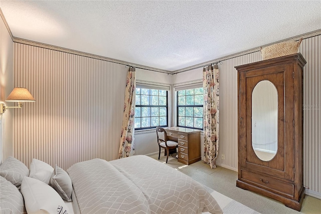 4917 Leatha Ln, Sarasota, FL 34232 - bedroom with a textured ceiling, carpet flooring, and baseboards