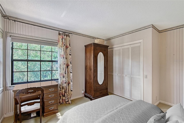 4917 Leatha Ln, Sarasota, FL 34232 - bedroom with a textured ceiling, baseboards, light carpet, and a closet