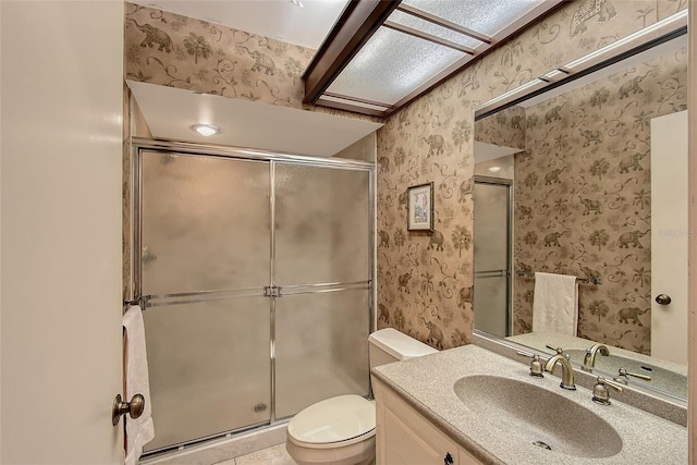 4917 Leatha Ln, Sarasota, FL 34232 - full bathroom featuring wallpapered walls, toilet, a stall shower, and vanity