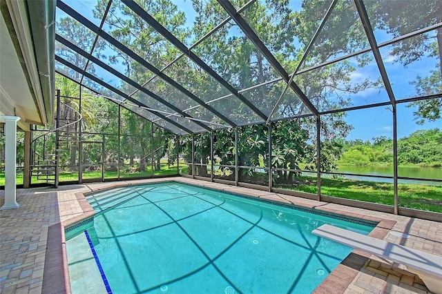 4917 Leatha Ln, Sarasota, FL 34232 - outdoor pool with a water view, a patio, glass enclosure, a diving board, and stairway